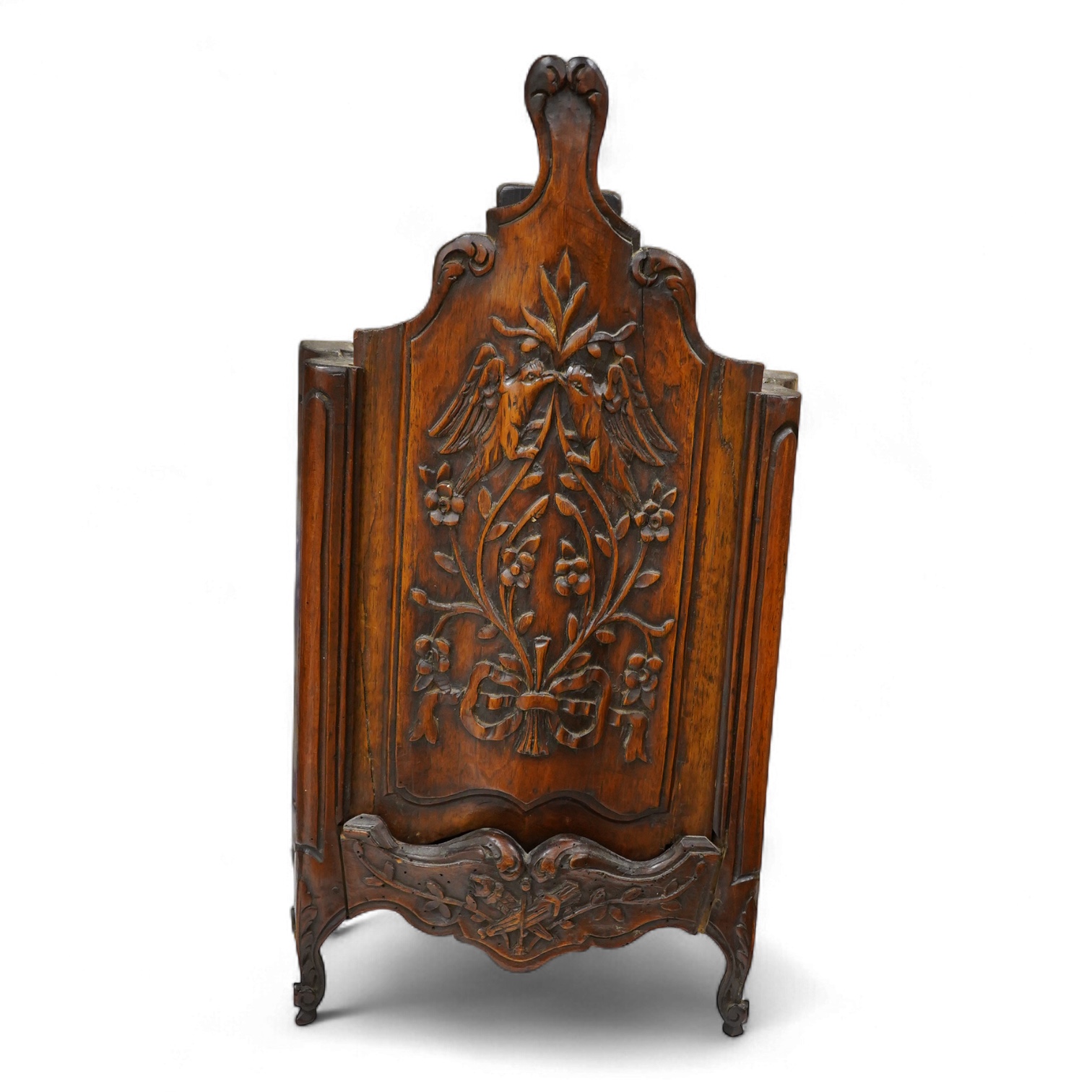 An 18th century French walnut candle box, modelled as a miniature armoire, carved with birds and flowers, 50cm high